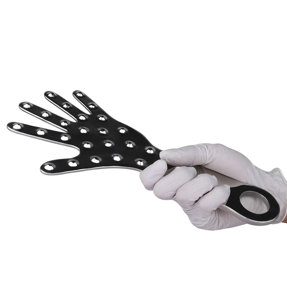 Metal Play Paddle with Raised Nubs on the Reverse Side for Varied Tactile Sensations. Suitable for Adult Use